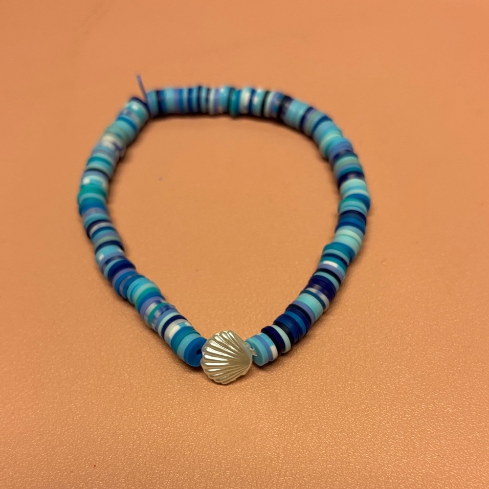 Blue Beaded Bracelet with Silver Shell Charm